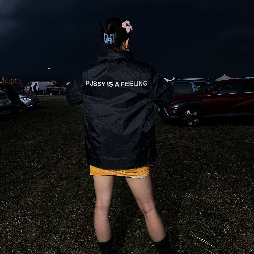 PUSSY IS A FEELING WATER REPELLENT BLACK JACKET WITH REFLECTIVE SIGN