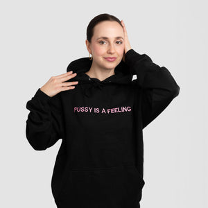 PUSSY IS A FEELING BLACK HOODIE WITH PINK SIGN