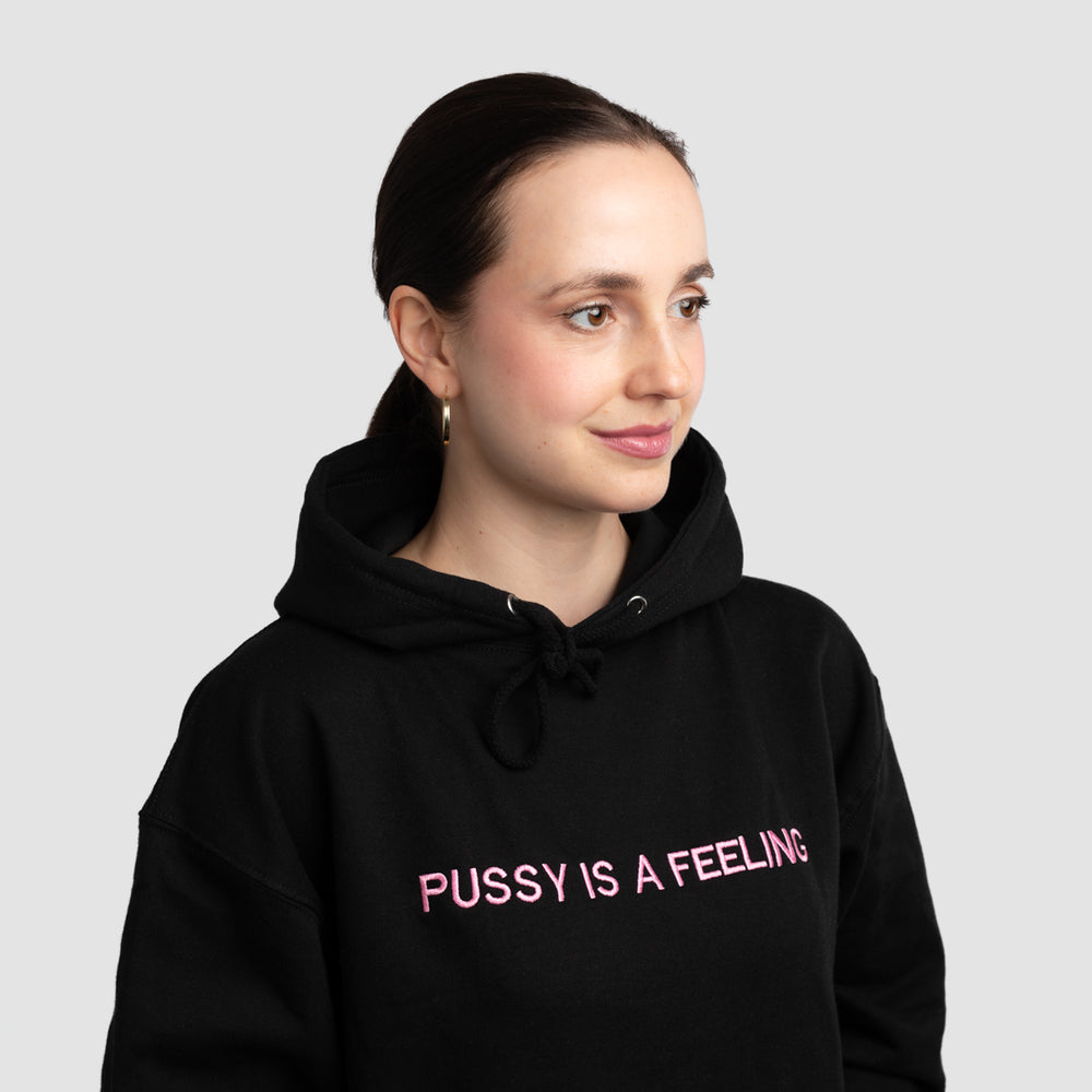 PUSSY IS A FEELING BLACK HOODIE WITH PINK SIGN