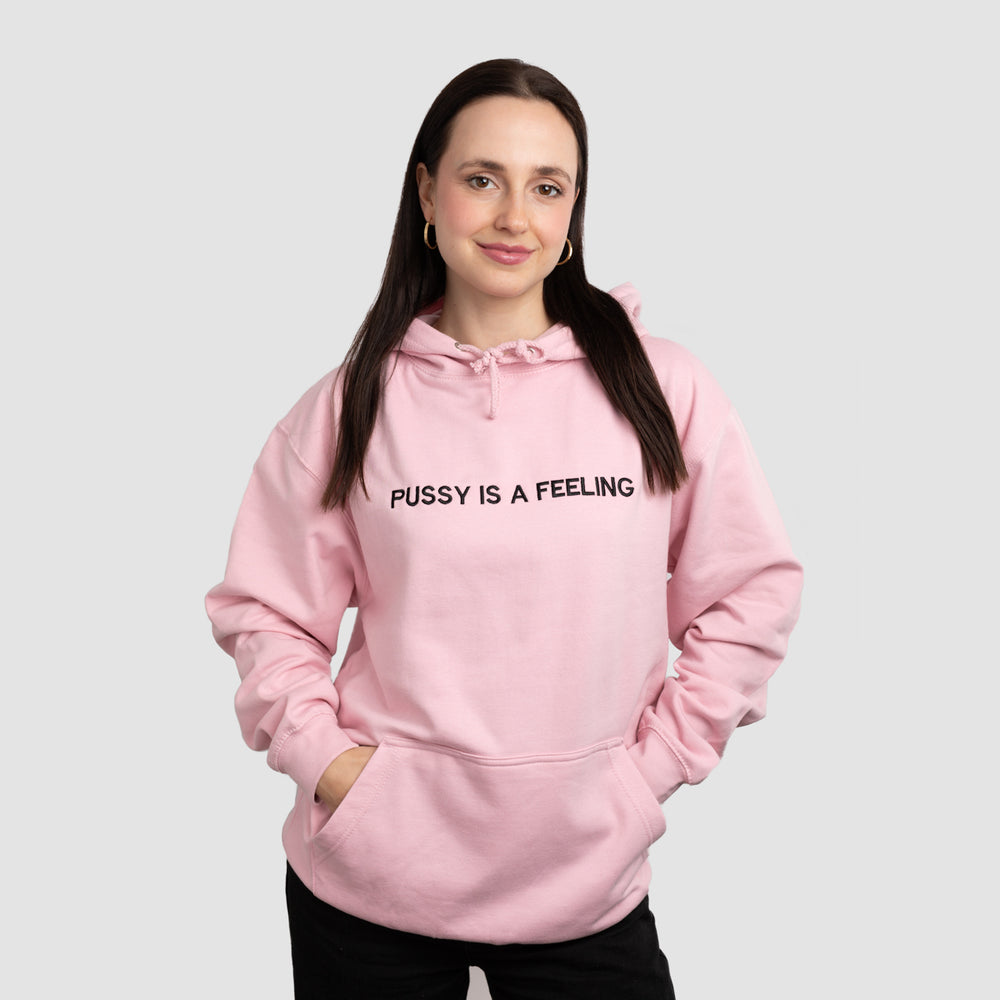 PUSSY IS A FEELING BABY PINK HOODIE WITH BLACK SIGN